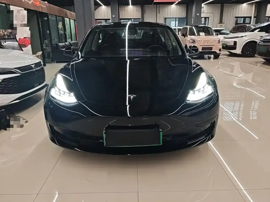 Tesla Model 3 — фото 7