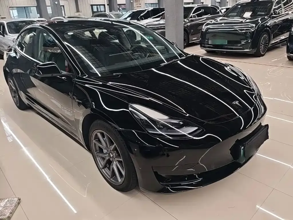 Tesla Model 3 — фото 5