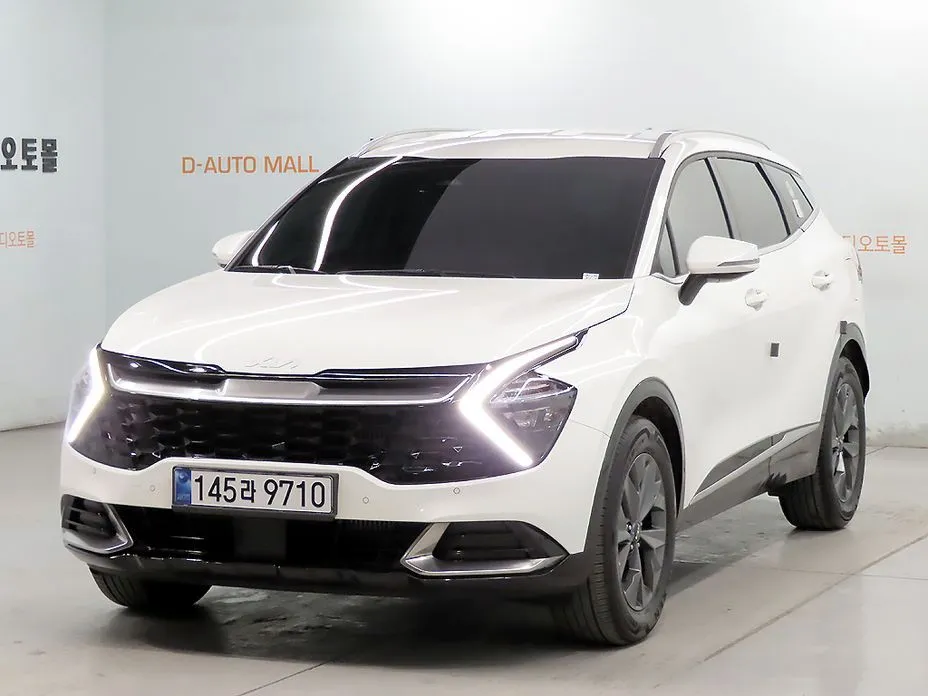 Kia Sportage — фото 1