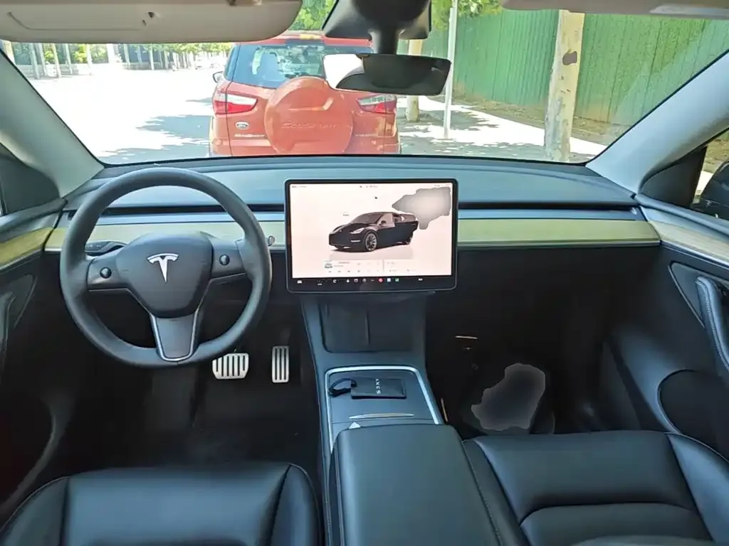 Tesla Model Y — фото 7