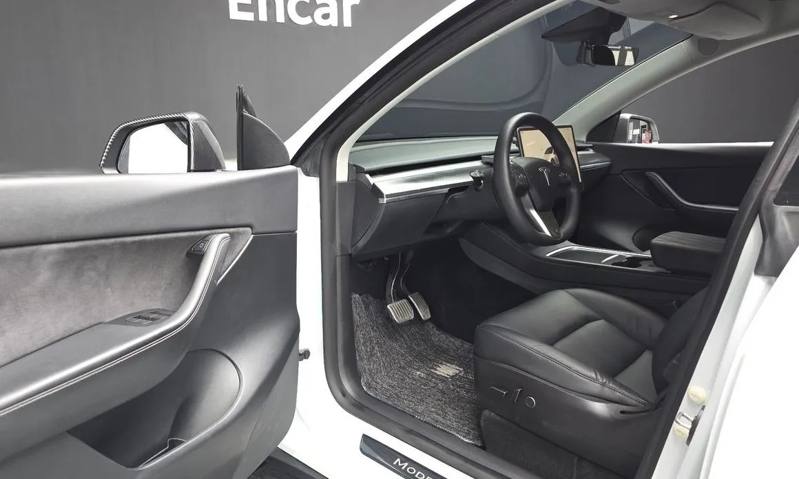 Tesla Model Y — фото 7
