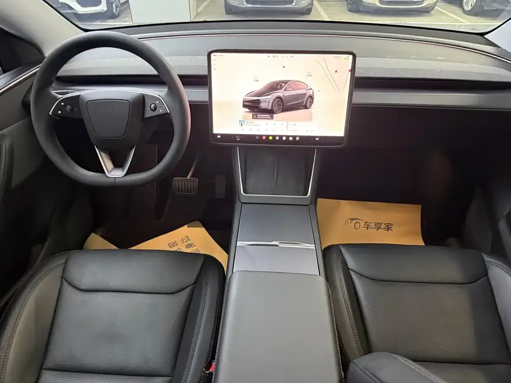 Tesla Model Y — фото 6