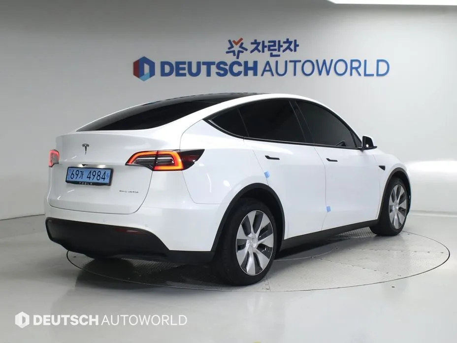 Tesla Model Y — фото 8