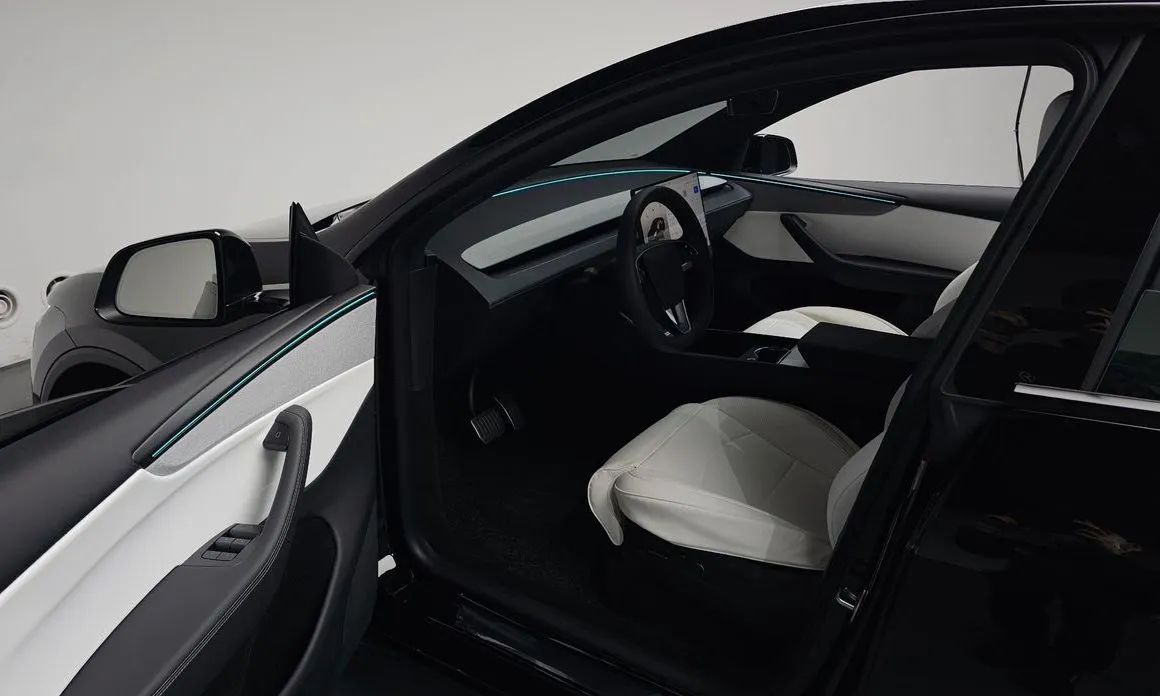 Tesla Model Y — фото 7