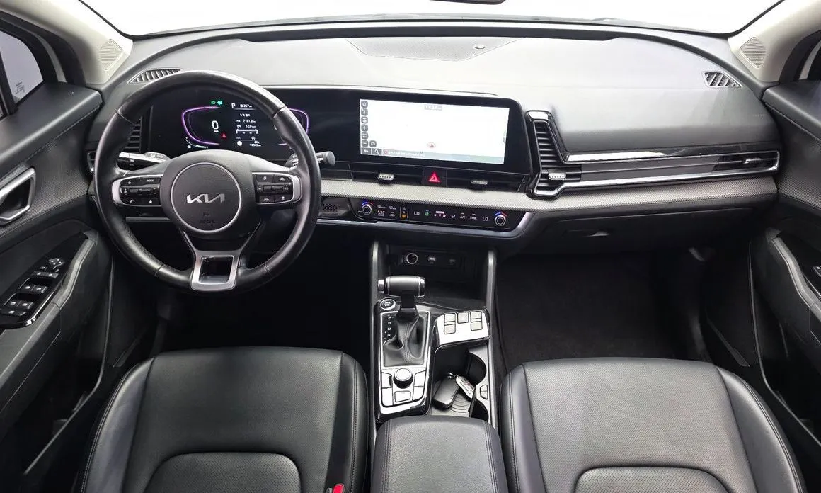 Kia Sportage — фото 7