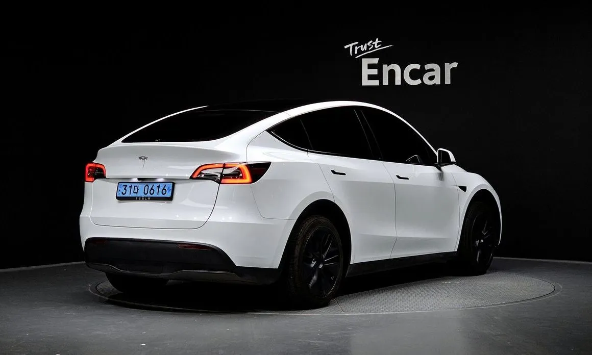 Tesla Model Y — фото 6