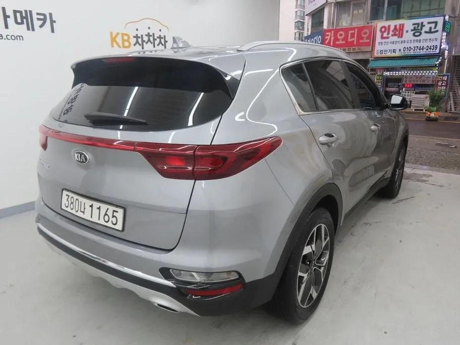Kia Sportage — фото 7