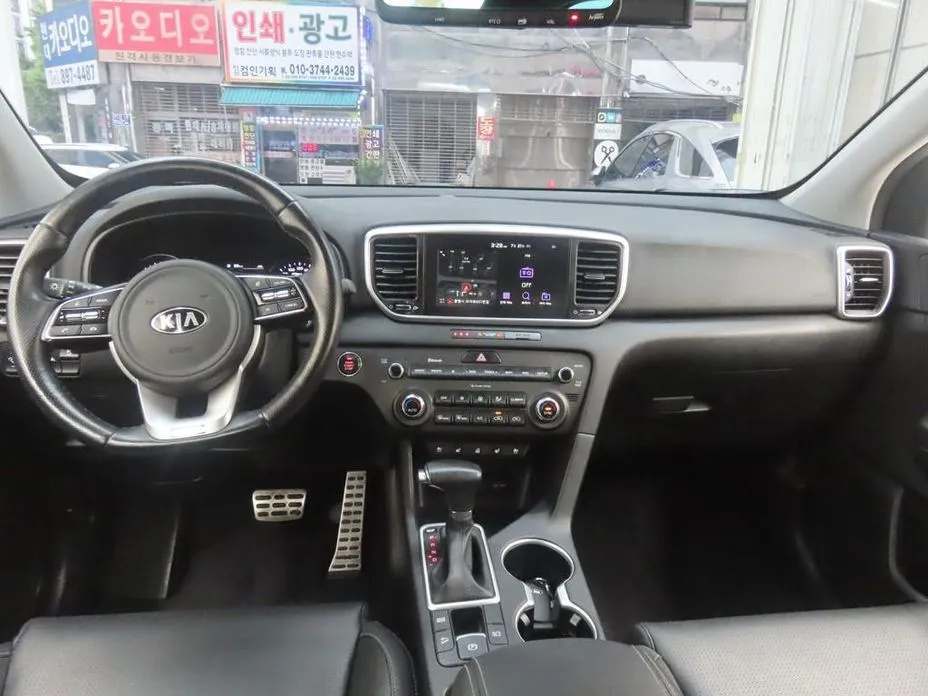 Kia Sportage — фото 9