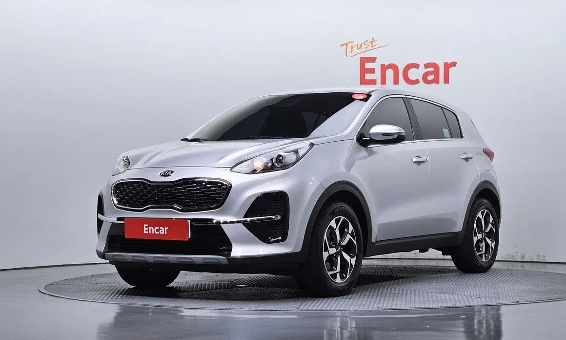 Kia Sportage — фото 1
