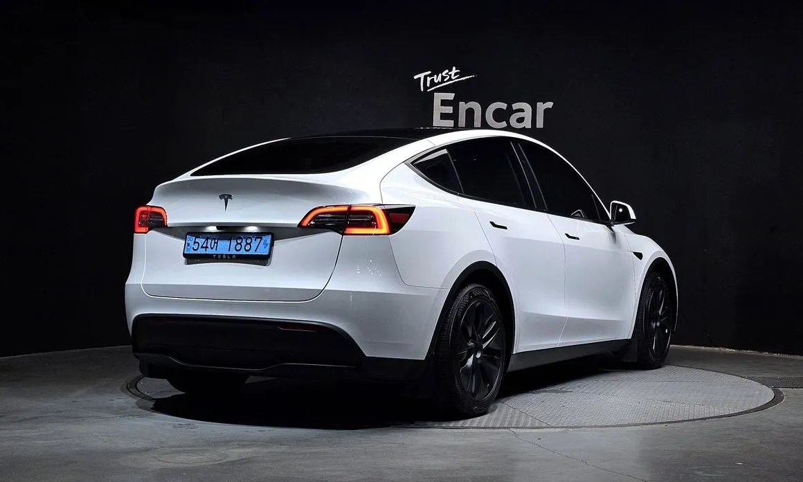Tesla Model Y — фото 5
