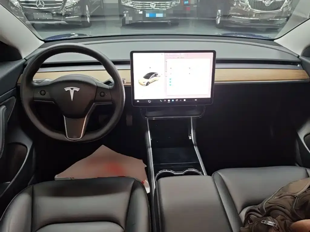 Tesla Model 3 — фото 6