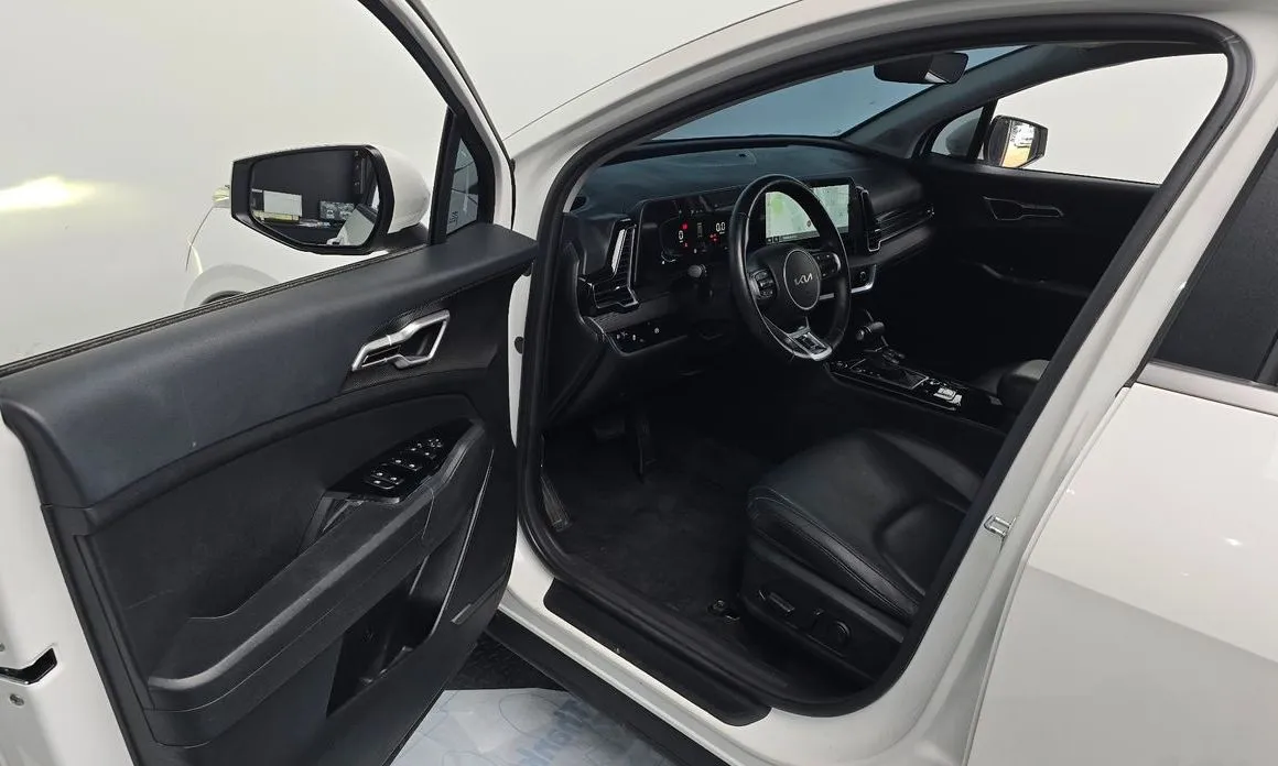 Kia Sportage — фото 8
