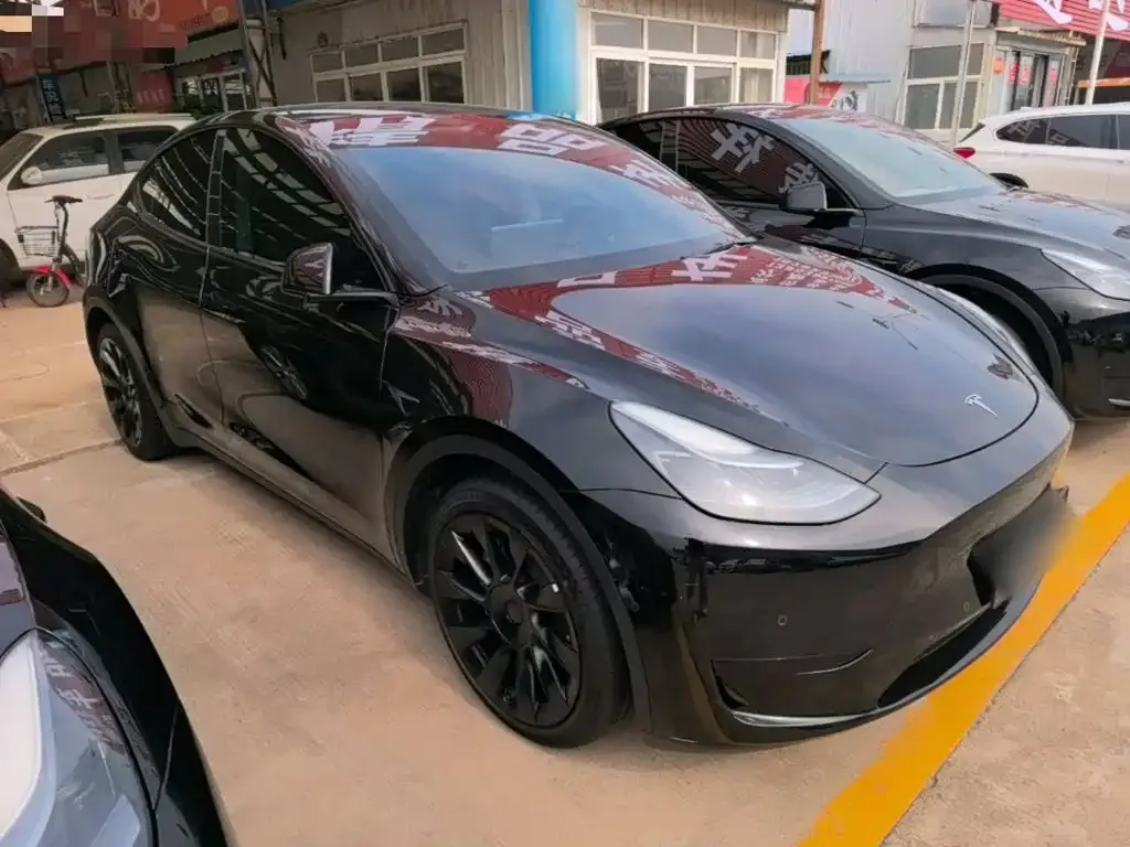 Tesla Model Y — фото 10