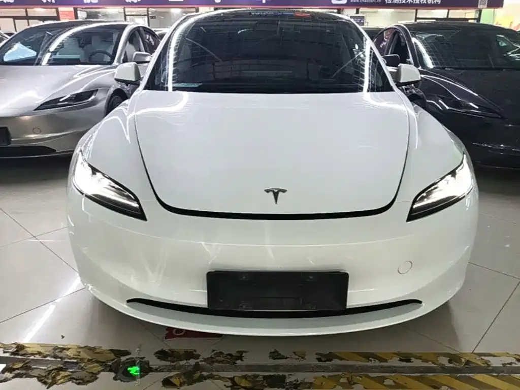 Tesla Model 3 — фото 10