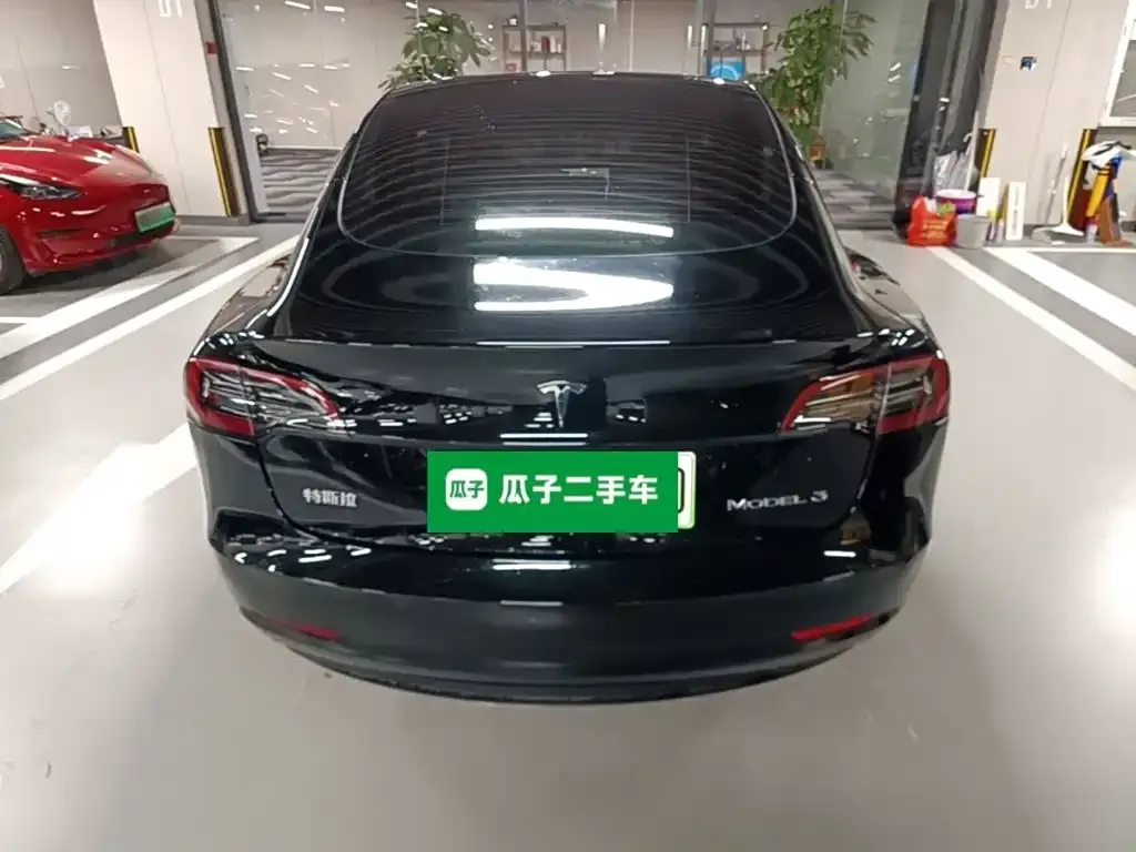 Tesla Model 3 — фото 5