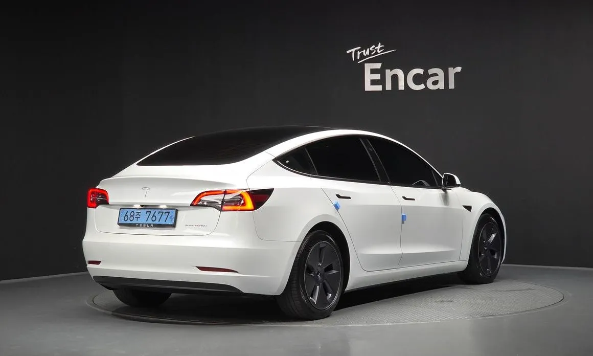 Tesla Model 3 — фото 7