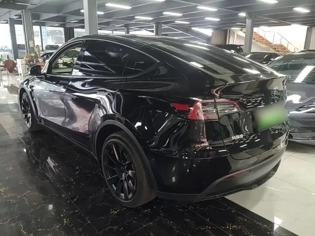 Tesla Model Y — фото 7
