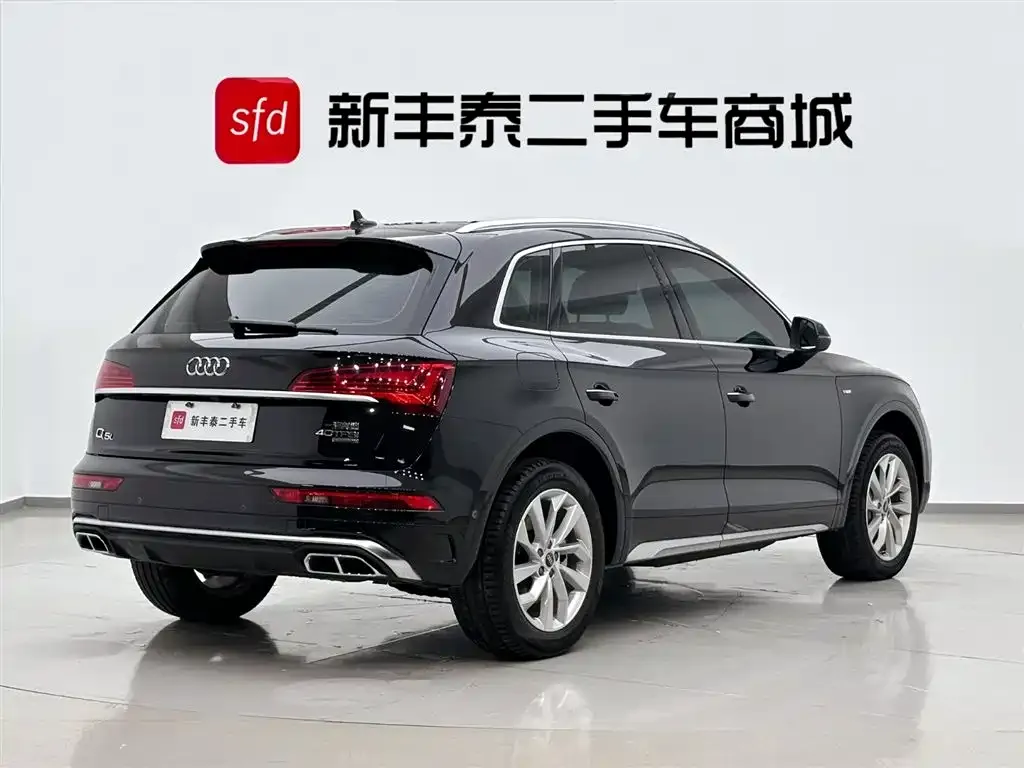 Audi Q5L — фото 6