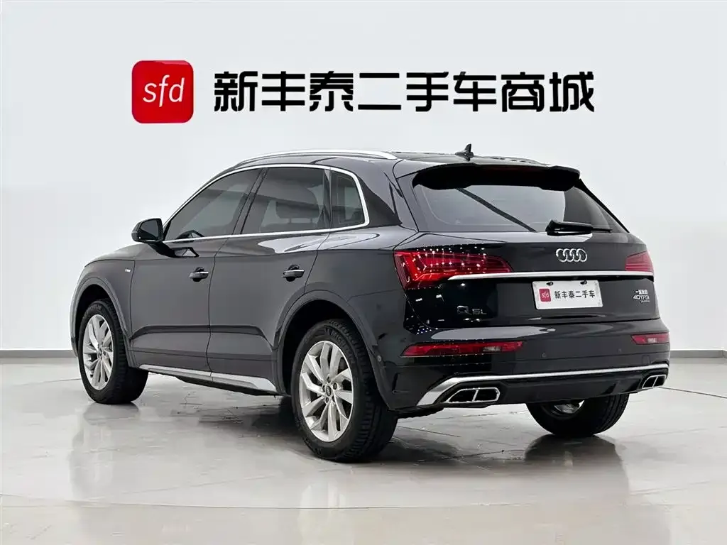 Audi Q5L — фото 10