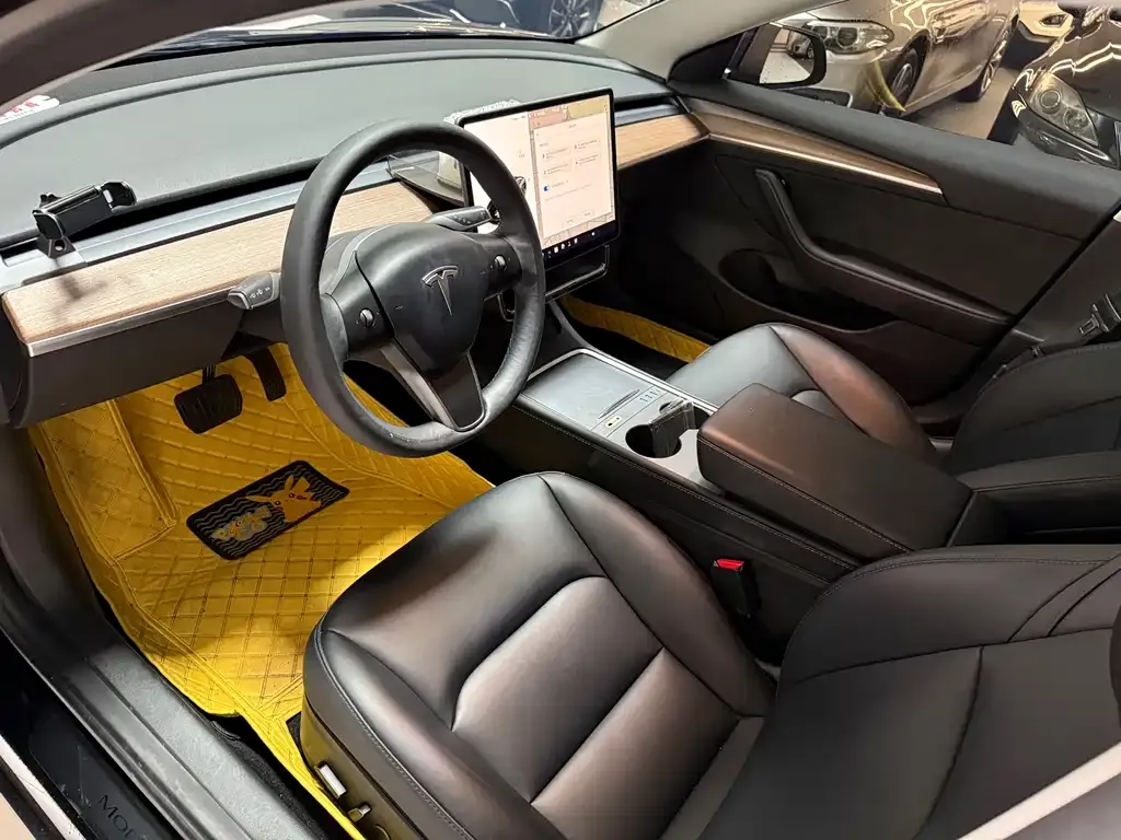 Tesla Model 3 — фото 10
