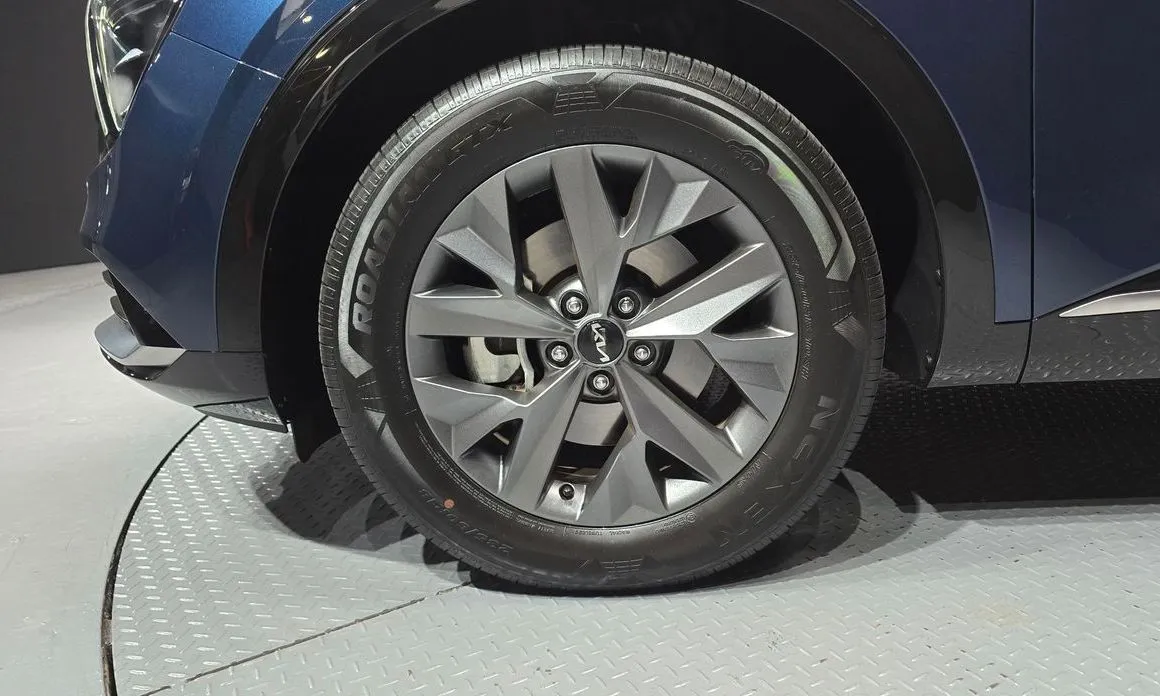 Kia Sportage — фото 10