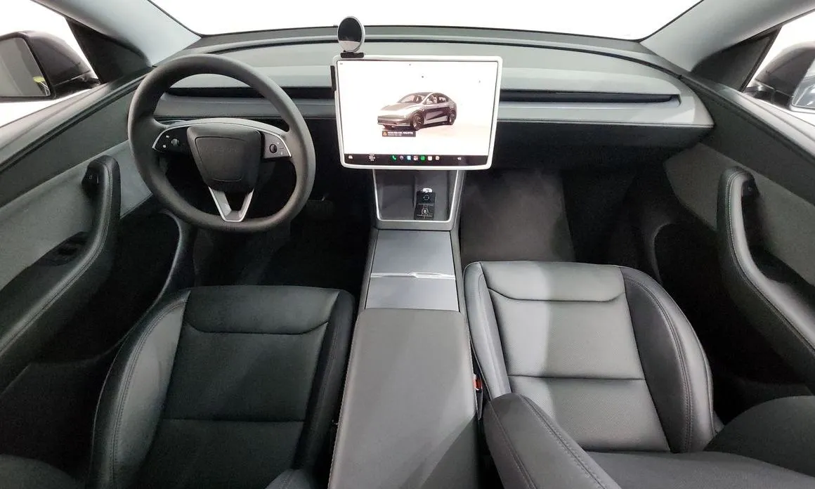 Tesla Model Y — фото 10