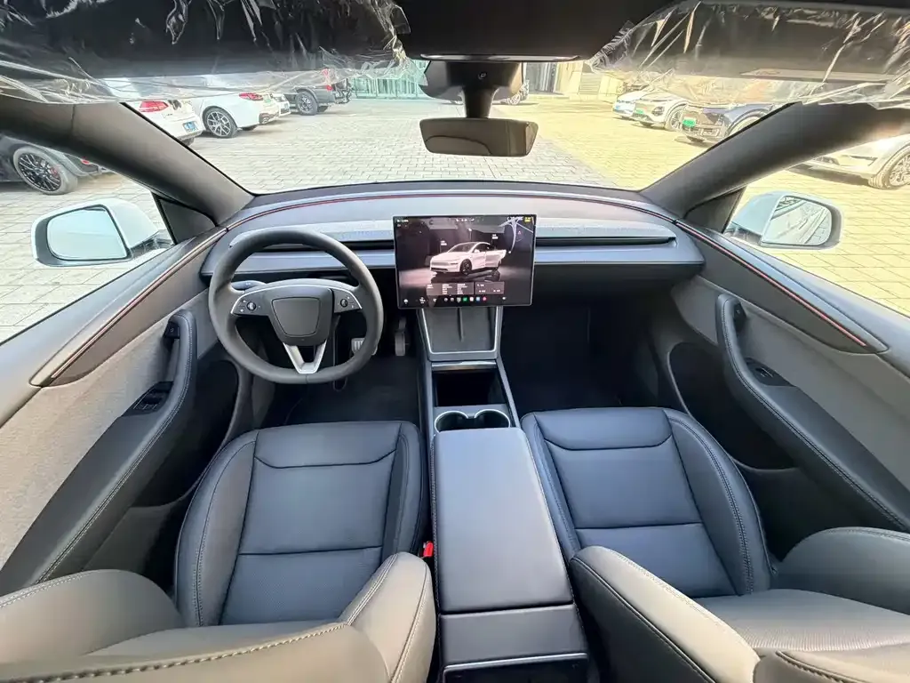 Tesla Model Y — фото 7