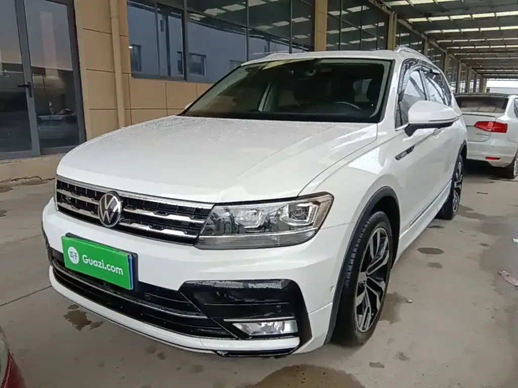 Volkswagen Tiguan L — фото 1