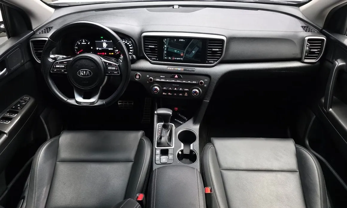 Kia Sportage — фото 10