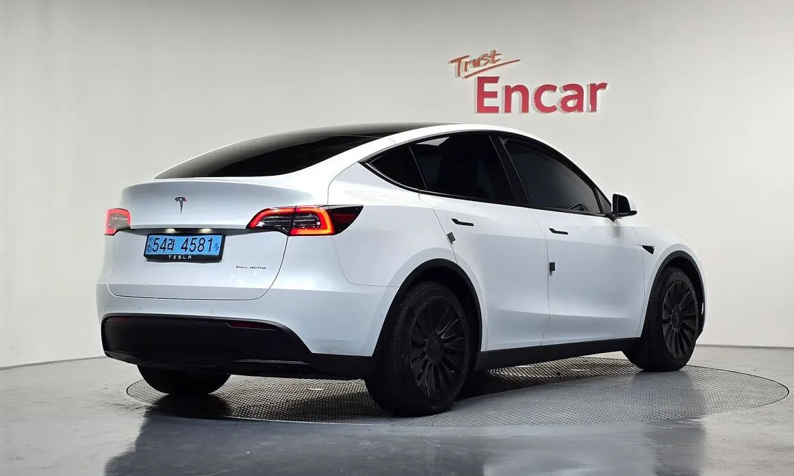 Tesla Model Y — фото 8