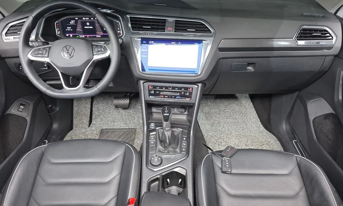 Volkswagen Tiguan — фото 8