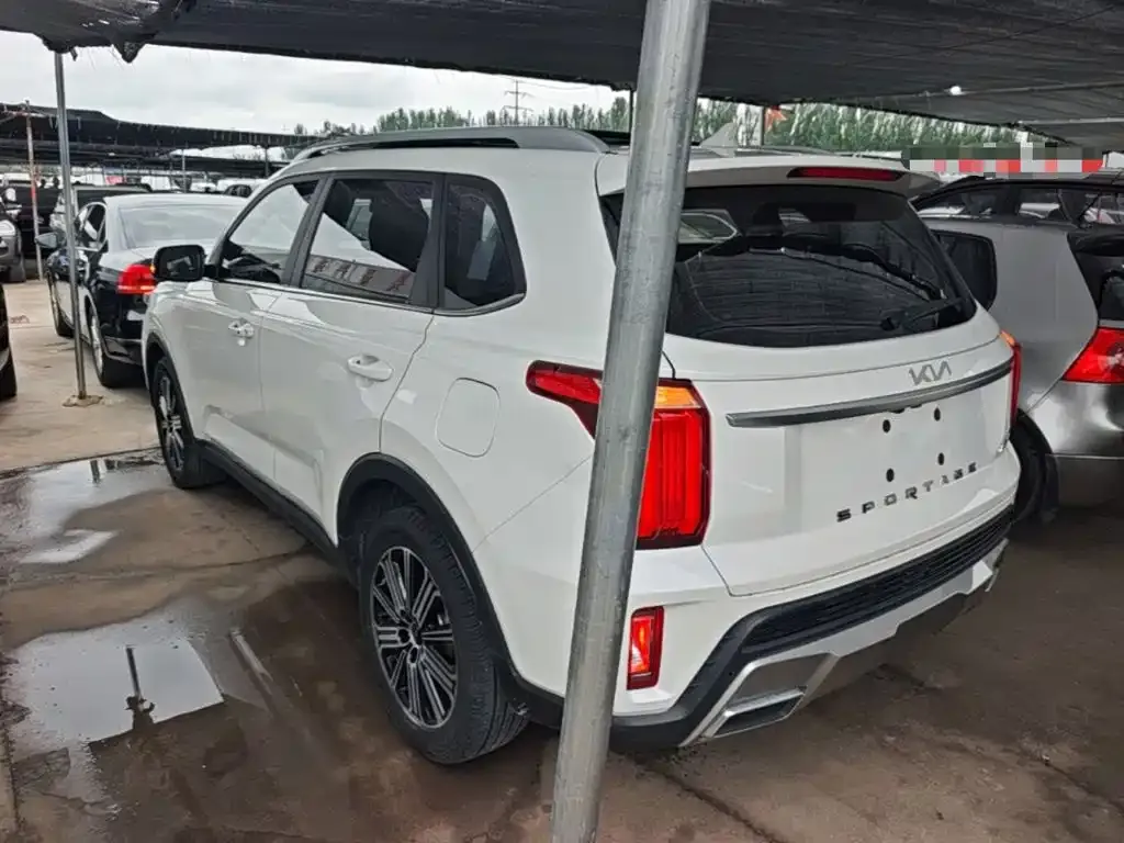 Kia Sportage — фото 7