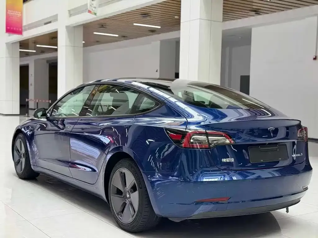 Tesla Model 3 — фото 7
