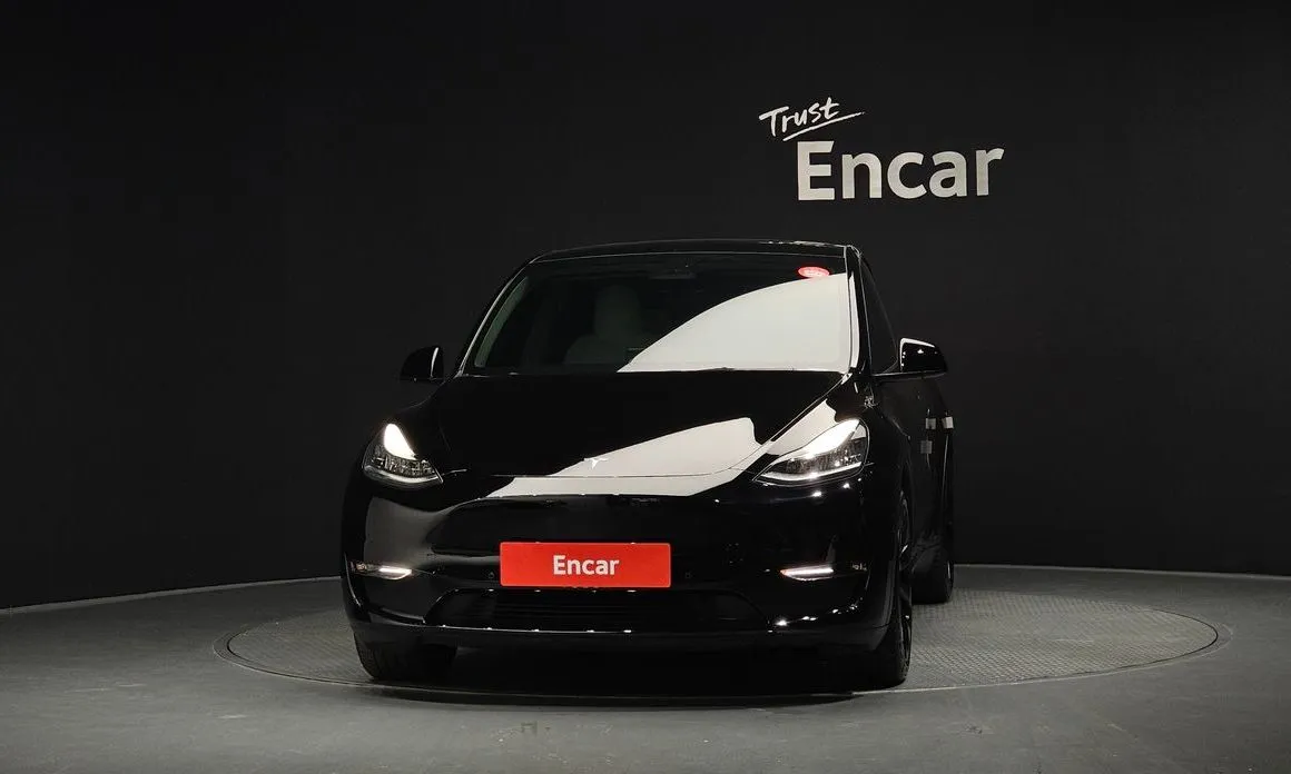 Tesla Model Y — фото 10