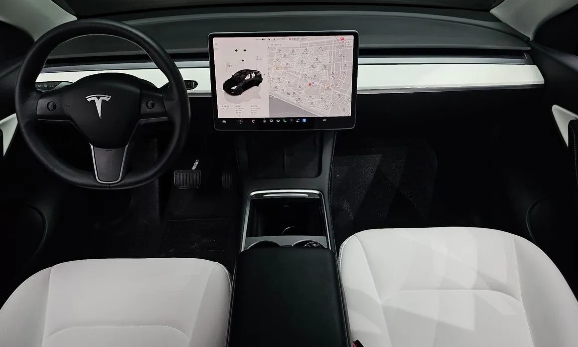Tesla Model Y — фото 7