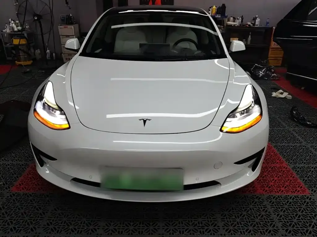 Tesla Model 3 — фото 10