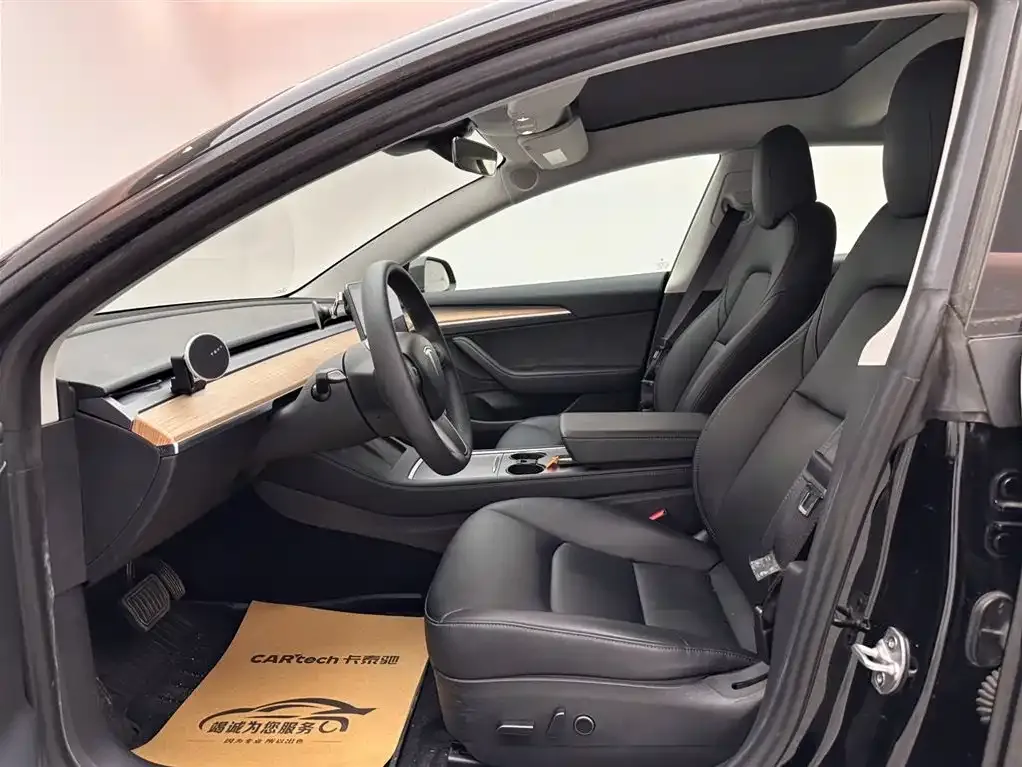 Tesla Model 3 — фото 10