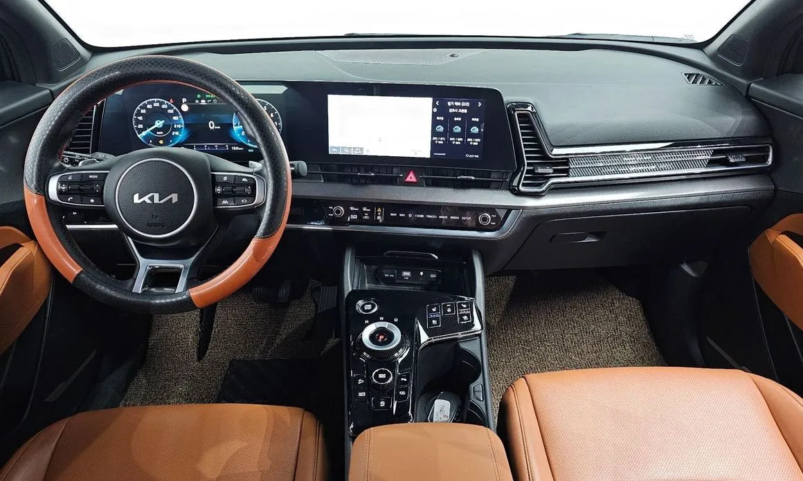 Kia Sportage — фото 10