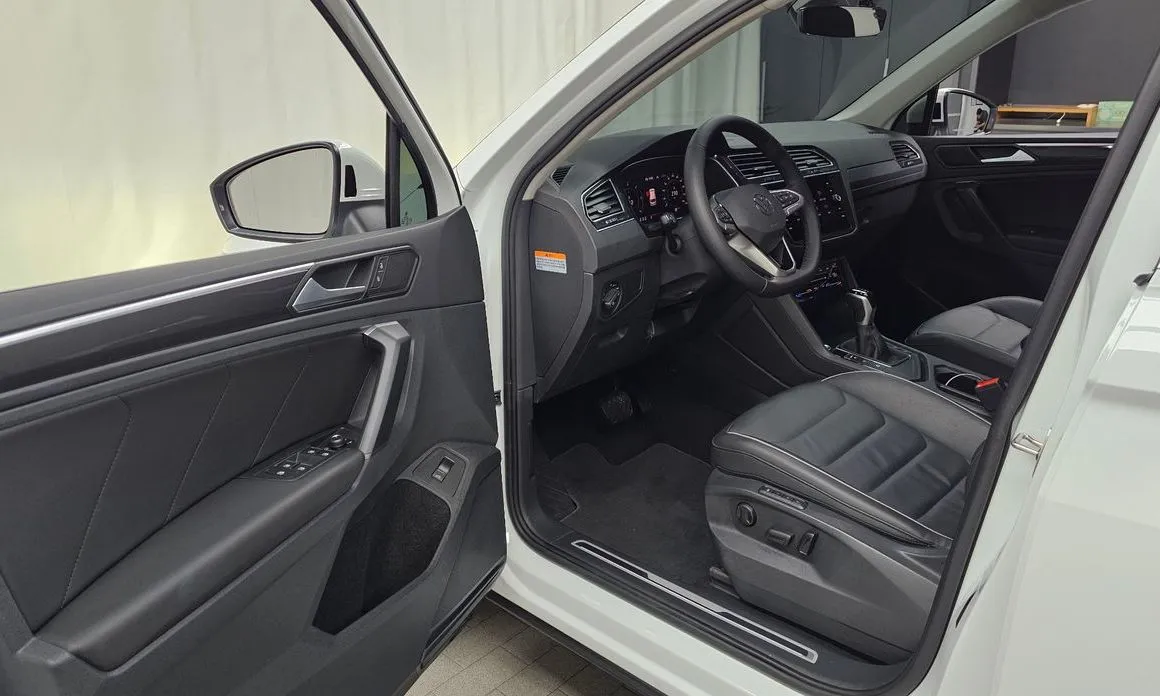Volkswagen Tiguan — фото 9