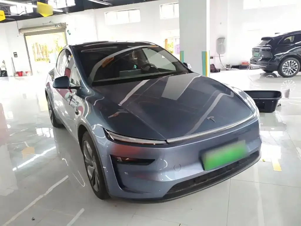 Tesla Model Y — фото 7