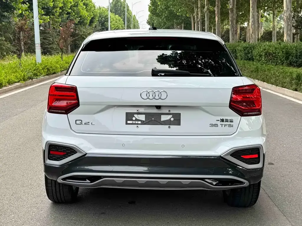 Audi Q2L — фото 7