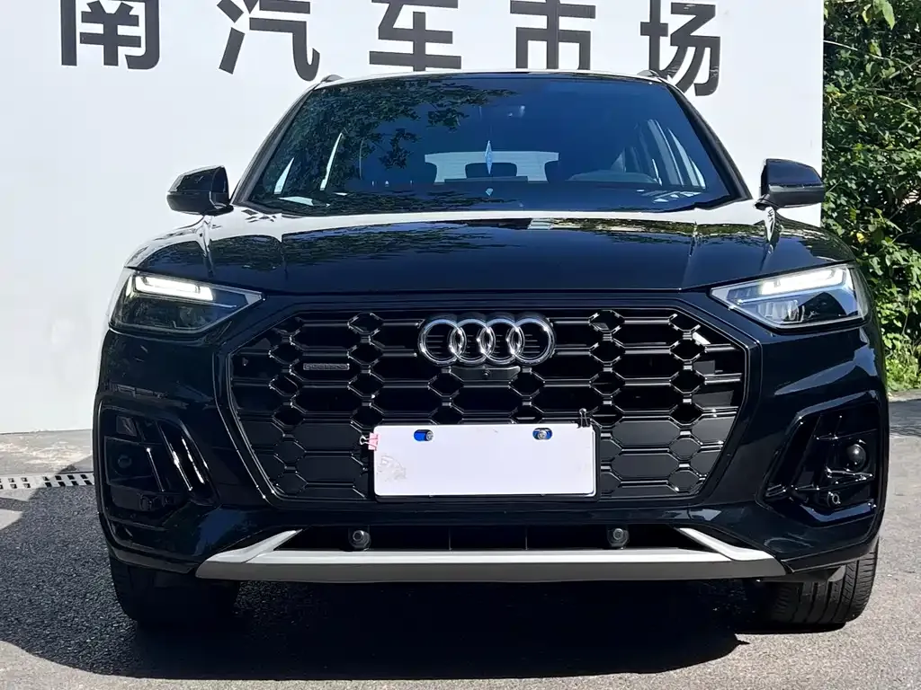 Audi Q5L — фото 5