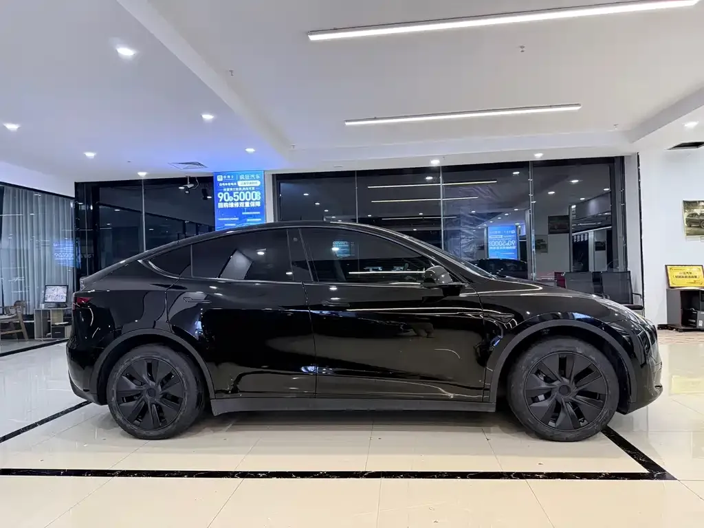 Tesla Model Y — фото 6