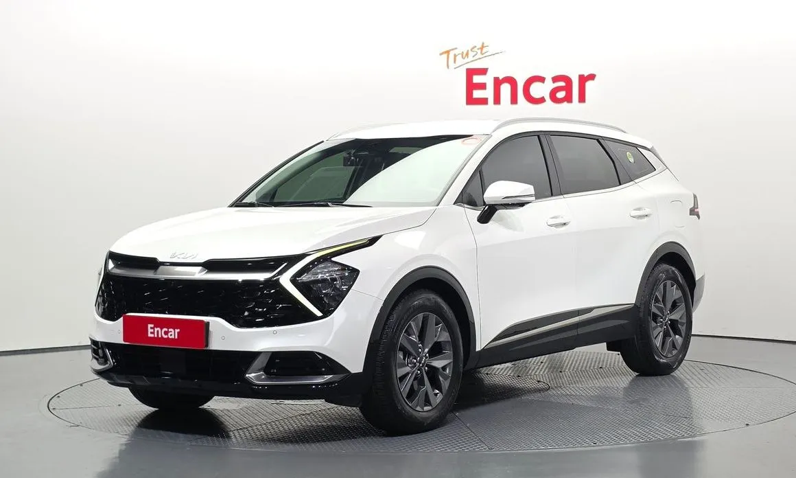 Kia Sportage — фото 1