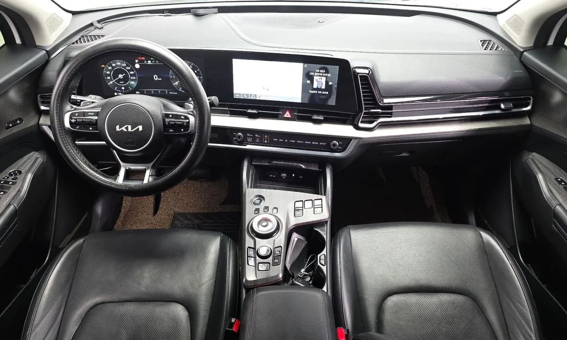 Kia Sportage — фото 10