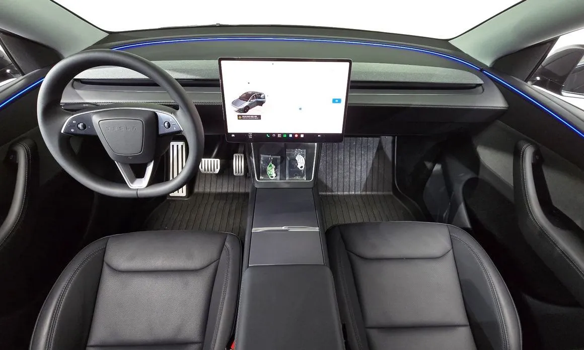 Tesla Model Y — фото 10