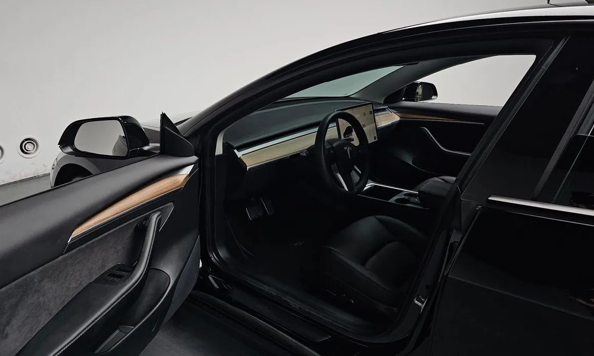 Tesla Model 3 — фото 8