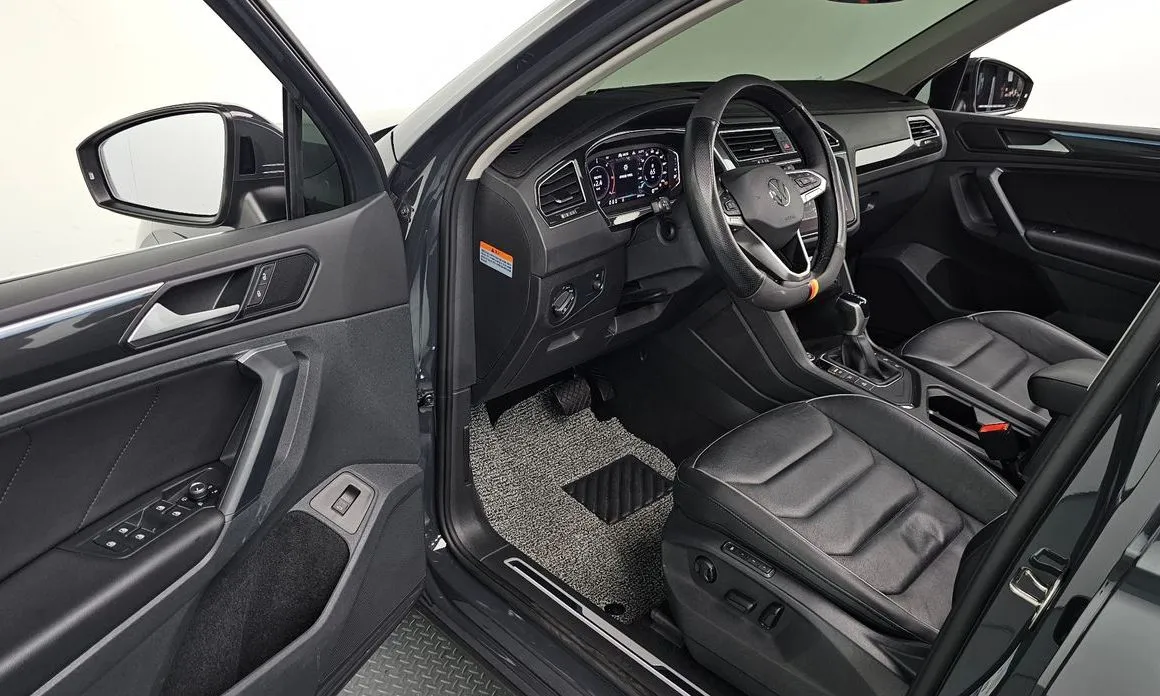Volkswagen Tiguan — фото 9