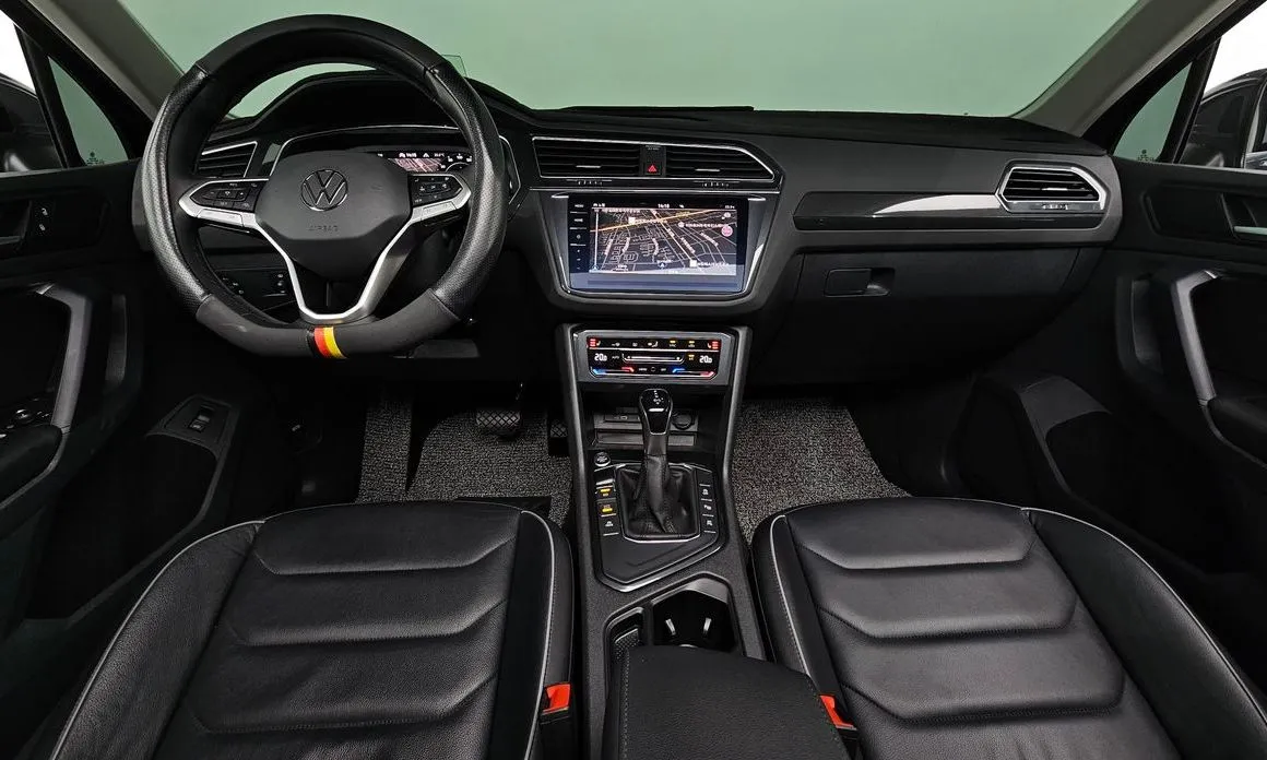 Volkswagen Tiguan — фото 6