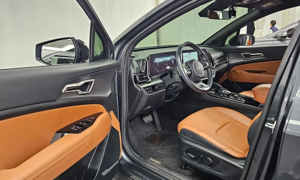 Kia Sportage — фото 10